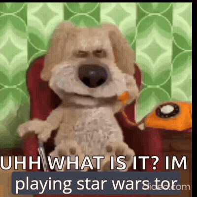 A Stuffed Dog Is Sitting In A Chair And Talking On A Phone . GIF