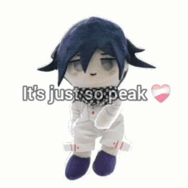 A Stuffed Doll With A Heart And The Words It 'S Just So Peak GIF