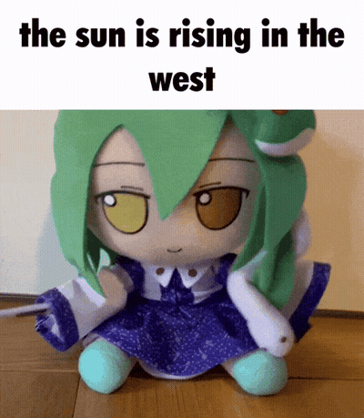 A Stuffed Doll With Green Hair And The Words The Sun Is Rising In The West On Top GIF