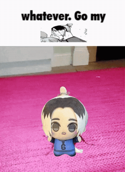 A Stuffed Doll With The Number 6 On It Is On A Pink Rug GIF