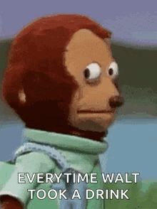 A Stuffed Monkey Is Standing In Front Of A Body Of Water And Says `` Every Time Walt Took A Drink '' . GIF