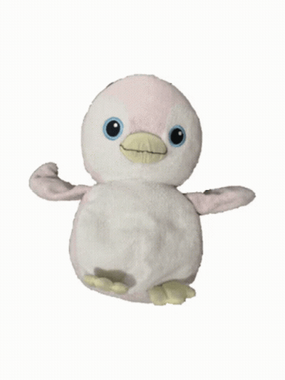 A Stuffed Penguin With A Yellow Beak Is Sitting On A White Background GIF