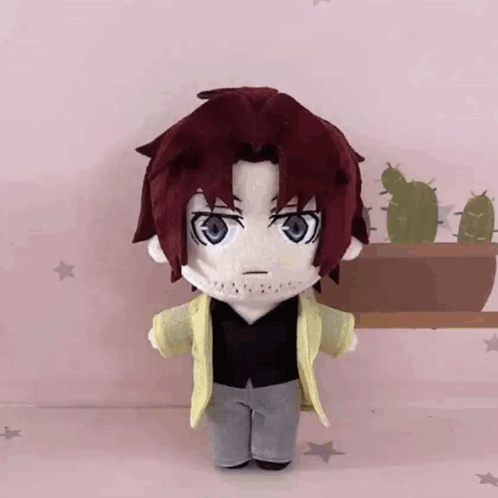 Red Hair Stuffed Toy Standing By Cactus GIF