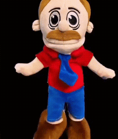 A Stuffed Toy With A Mustache And A Tie Is Dancing . GIF