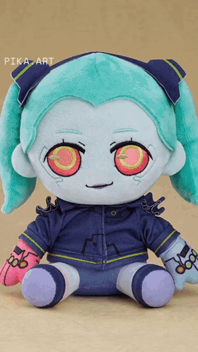 A Stuffed Toy With Pika Art Written On The Bottom Right GIF
