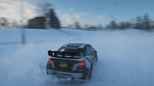 A Subaru Car Driving Through The Snow With A New York License Plate GIF