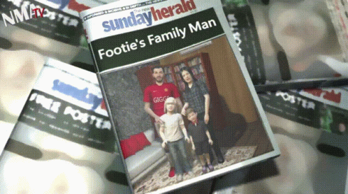 A Sunday Herald Newspaper With A Picture Of A Family On The Cover GIF