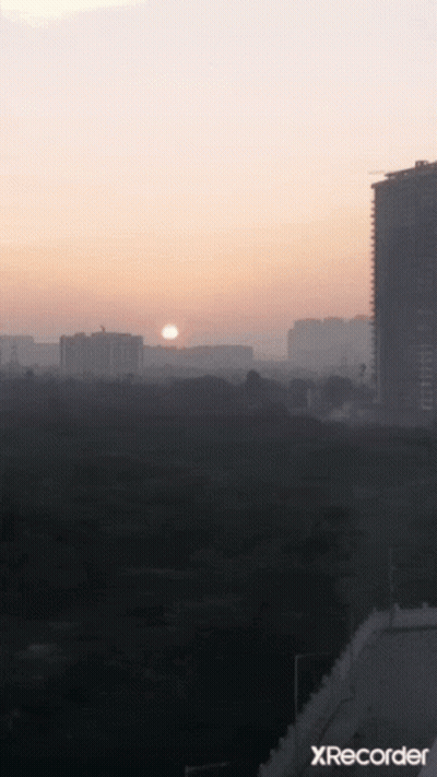 A Sunset Over A City With A Xrecorder Watermark GIF