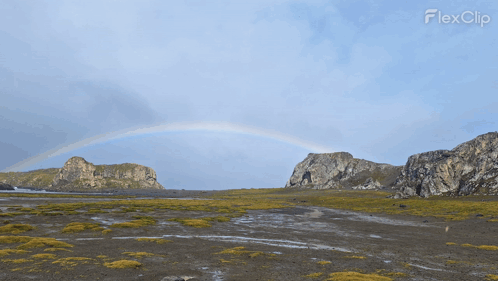 A Sunset Over A Snowy Landscape With The Word Flexclip In The Corner GIF