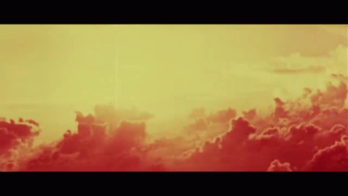 A Sunset With A Lot Of Clouds In It GIF