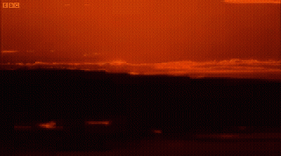 A Sunset With The Bbc Logo In The Upper Right Corner GIF