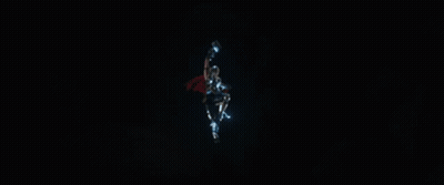 A Superhero With A Red Cape And A Lightning Bolt GIF