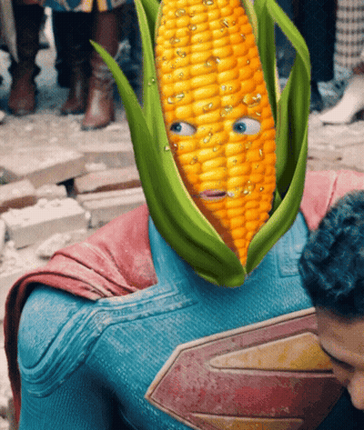 A Superman With A Corn On The Cob On His Face GIF