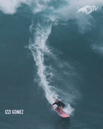 A Surfer Is Riding A Wave With The Name Izzi Gomez On The Bottom GIF