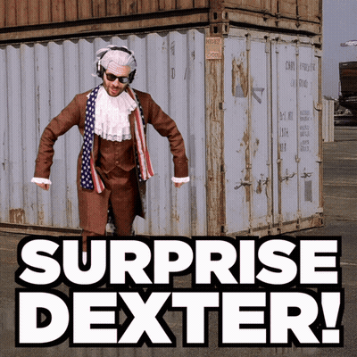 A Surprise Dexter Advertisement With A Man In A Suit GIF