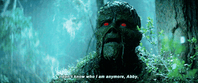 A Swamp Creature With Red Eyes Says " I Don T Know Who I Am Anymore Abby " GIF