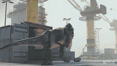 A T-Rex Is Standing In Front Of A Netflix Building GIF