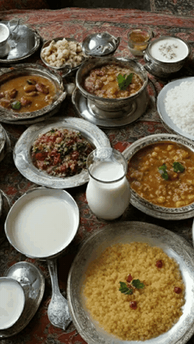 A Table Topped With A Variety Of Food Including Rice And Milk GIF