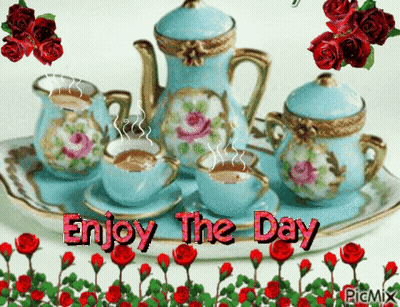 A Tea Set On A Tray With The Words Enjoy The Day On It GIF