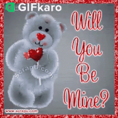 A Teddy Bear Holding A Heart Shaped Lollipop With The Words `` Will You Be Mine '' Written On It . GIF