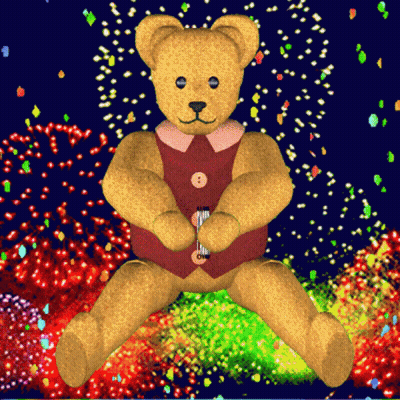 A Teddy Bear In A Red Vest Is Sitting In Front Of Fireworks GIF