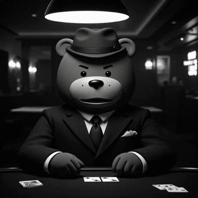 A Teddy Bear In A Suit And Fedora Holding A Bunch Of Cards GIF