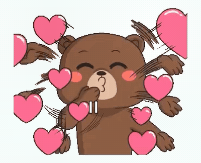 A Teddy Bear Is Blowing A Kiss With Hearts Around Him . GIF