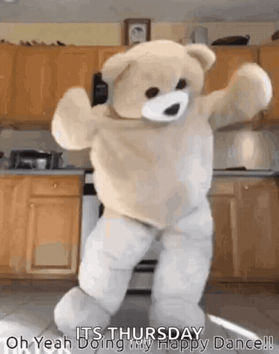 A Teddy Bear Is Dancing In A Kitchen In A Happy Dance . GIF