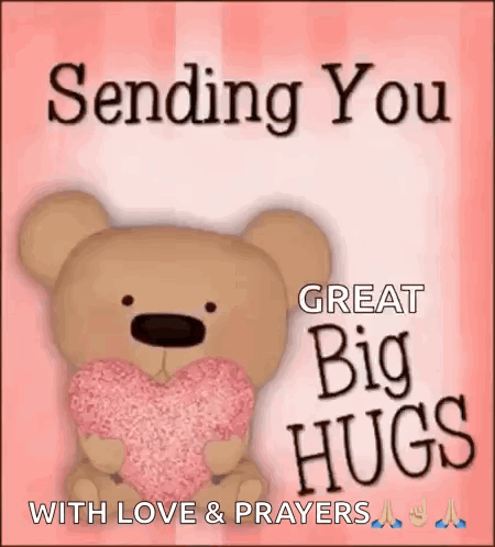A Teddy Bear Is Holding A Pink Heart And Saying `` Sending You Great Big Hugs With Love And Prayers '' . GIF