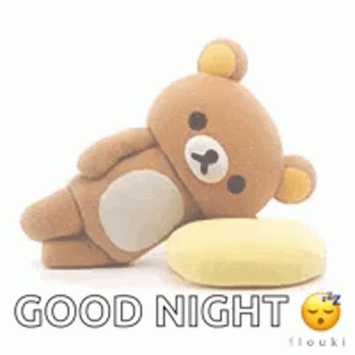 A Teddy Bear Is Laying On A Pillow With The Words `` Good Night '' Written Below It . GIF
