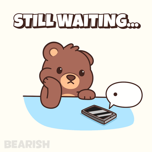 A Teddy Bear Is Sitting At A Table With A Cell Phone And A Speech Bubble That Reads Still Waiting GIF