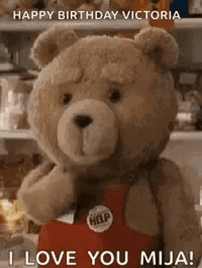A Teddy Bear Is Wearing A Red Apron And Says `` Happy Birthday Victoria I Love You Mija ! '' GIF