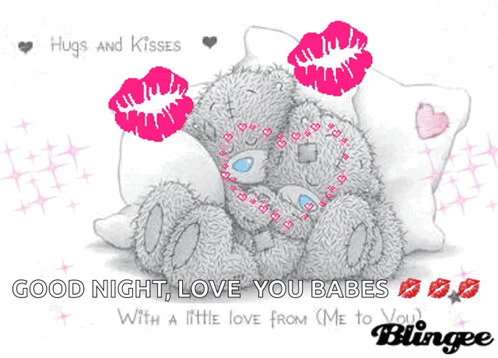 A Teddy Bear Laying On A Pillow With Hugs And Kisses GIF