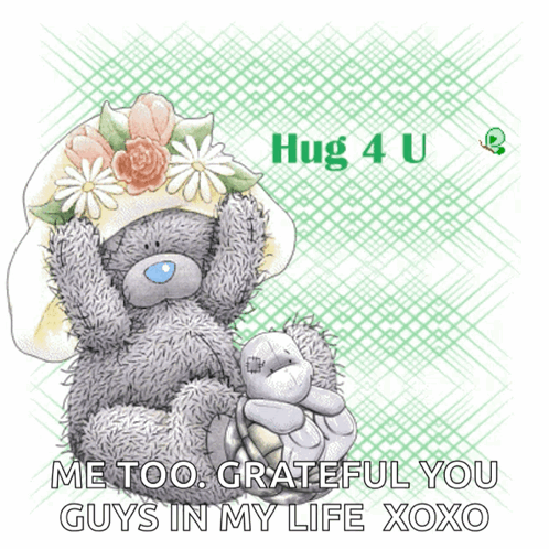 A Teddy Bear Wearing A Hat With Flowers On It Says Hug 4 U GIF
