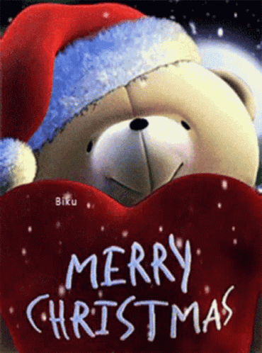 A Teddy Bear Wearing A Santa Hat Is Holding A Red Heart With The Words Merry Christmas Written On It GIF