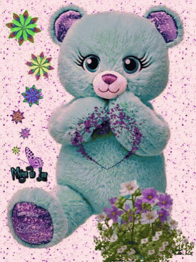 A Teddy Bear With A Heart On Its Chest Is Surrounded By Flowers GIF