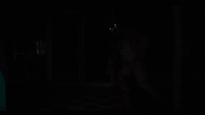 A Teddy Bear With Glowing Eyes Is In The Dark GIF