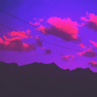 A Telephone Pole With A Purple Sky In The Background GIF