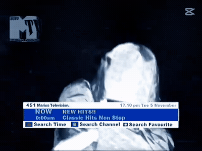 A Television Screen Shows A Ghostly Figure And Says New Hits GIF