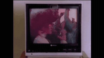 A Television With A Picture Of A Man And Woman On It GIF