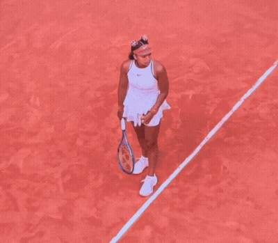A Tennis Court With A Bnp Paribas Banner On The Wall GIF