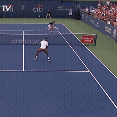 A Tennis Court With A Emirates Sign On It GIF