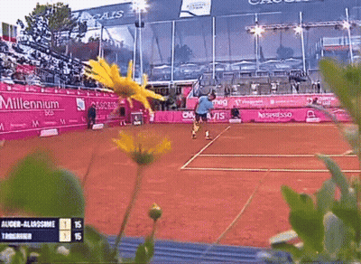 A Tennis Match Is Being Played In Front Of A Millennium Stadium GIF
