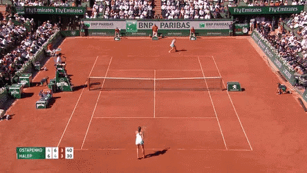A Tennis Match Is Being Played On A Court Sponsored By Bnp Paribas And Fly Emirates GIF