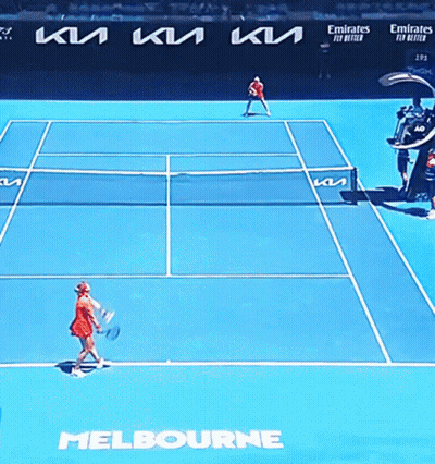 A Tennis Match Is Being Played On A Court Sponsored By Emirates Fly Better GIF