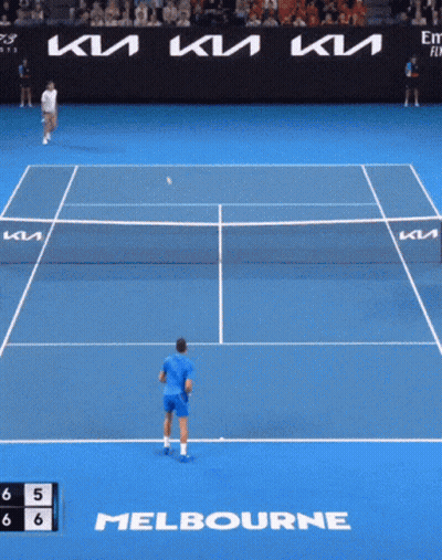 A Tennis Match Is Being Played On A Court That Says Melbourne On It GIF
