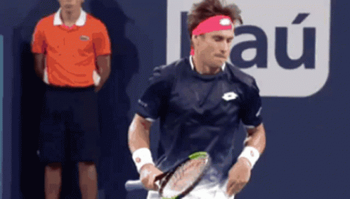A Tennis Player In Front Of A Sign That Says " Au " GIF