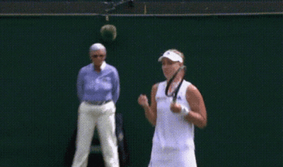 A Tennis Player Wearing A White Hat With The Adidas Logo On It GIF