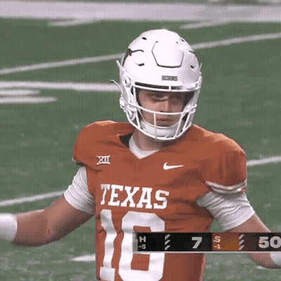 A Texas Football Player Wearing A Helmet And Number 16 GIF