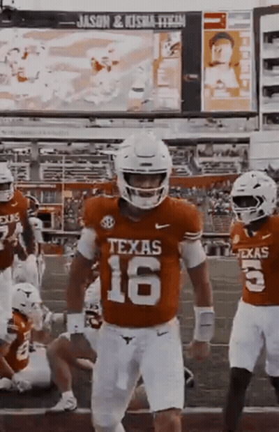 A Texas Football Player Wearing The Number 16 Jersey GIF